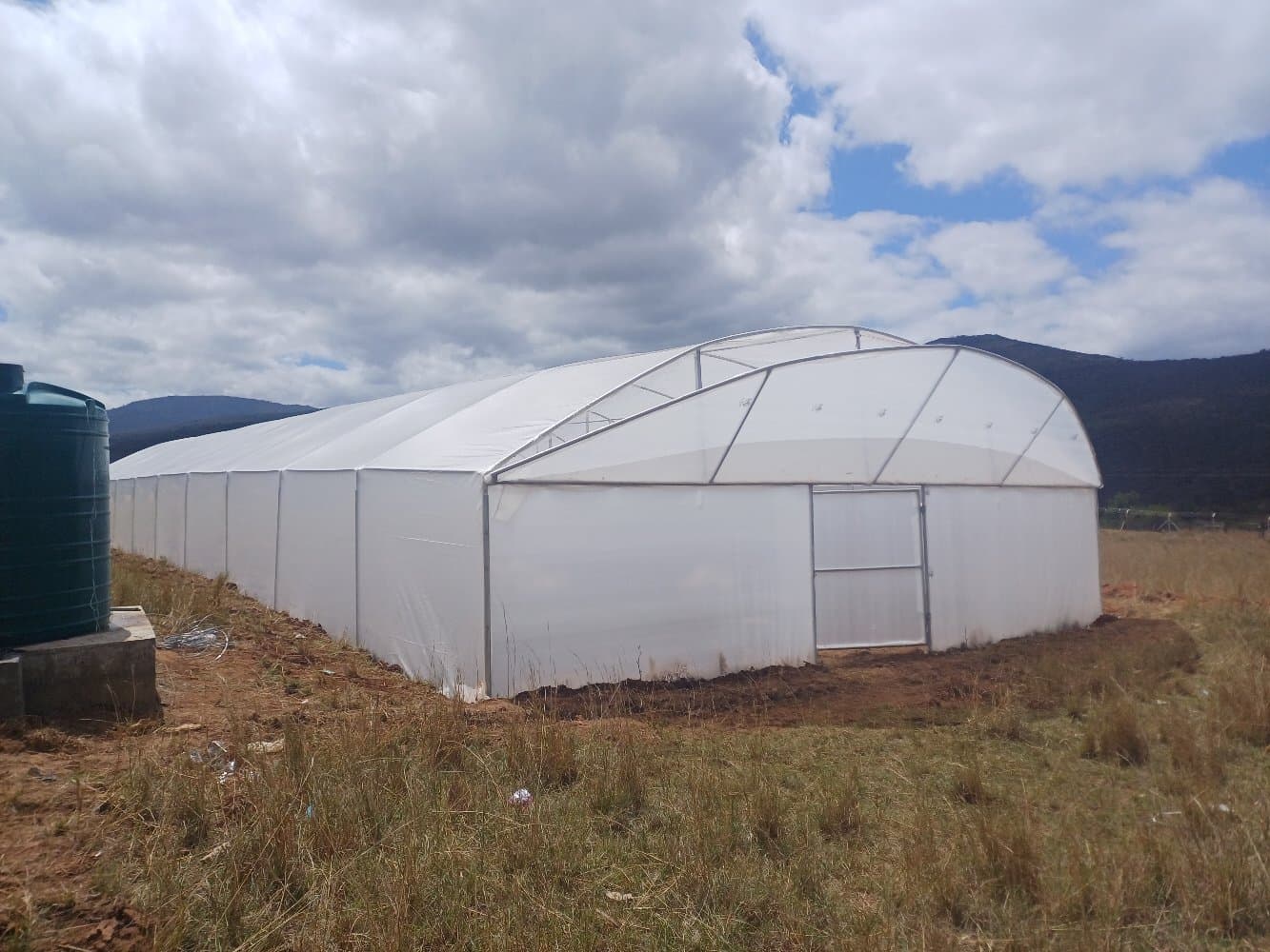 Water storage and pumping infrastructure for greenhouse supply